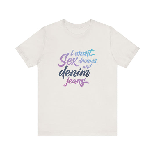 White t-shirt with colorful text 'I want sex dreams and denim jeans' on a white background